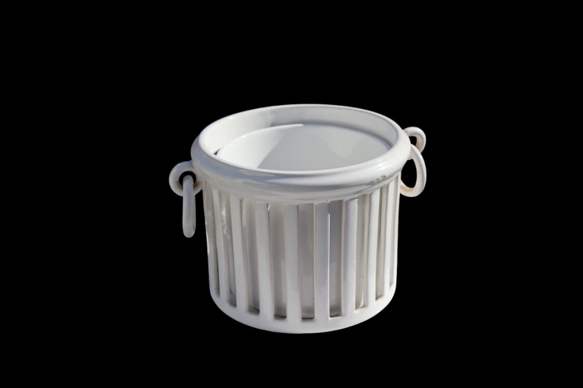 Cache-pot empire ajouré et son pot